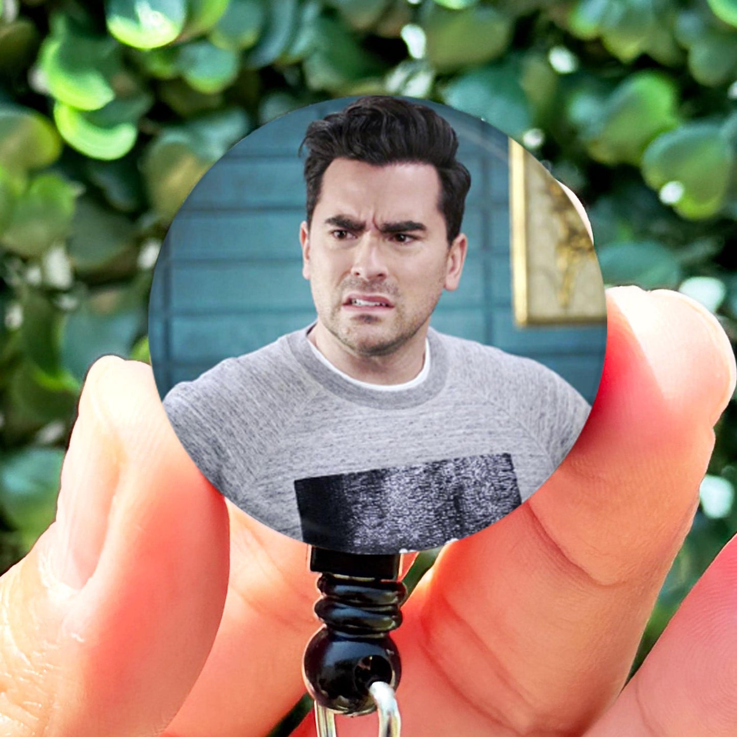 a person holding a key to a house