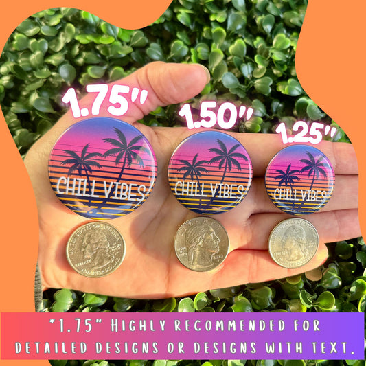 a hand holding three circular buttons with a tropical design, each with a different size. The buttons are placed next to a palm tree and a quarter, indicating their size relative to the buttons.